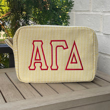 Alpha Gamma Delta Yellow seersucker Cosmetic Bag