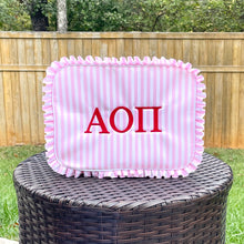 Alpha Omicron Pink Ruffle Cosmetic bag